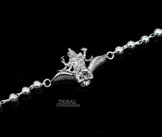 This amazing silver Rakhi crafted from 925 silver with immense precision. It exudes excellent craftsmanship and will surely look wonderful on your brother's wrist. handmade custom lord vishnu with garuda Bracelet Or Rakhi bracelet this is special design beaded bracelet we can use either Rakhi bracelet or daily use bracelet for unisex. Best Rakshabandhan wishes sibling gift for your brother and sister's. Metal-925 sterling silver. Item type-Rakhi Bracelet. Length-6 inches.to 9 inches (select you Symbolic Bracelet Jewelry For Puja, Silver Bracelet For Puja And Festivals, Symbolic Silver Jewelry For Puja, Sterling Silver Jewelry With Silver Beads For Puja, Sterling Silver Beads Jewelry For Puja, Sterling Silver Beaded Jewelry For Puja, Sterling Silver Bracelet Jewelry For Rituals, Symbolic Silver Bracelets For Festivals, Silver Spiritual Bracelet For Rituals