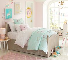 a child's bedroom with pink walls and white carpeting, including a bed