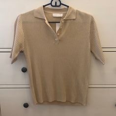 Nwt Short Sleeve Ribbed Polo Fits Like A Small/Medium. 100% Acrylic. Cream Cotton Polo Shirt With Ribbed Collar, Beige Short Sleeve Polo Sweater With Ribbed Collar, Casual Beige Short Sleeve Polo Shirt, Beige Cotton Polo Collar Top, Polo Fits, Beige Relaxed Fit Polo Shirt, Satin Button Down Shirt, Applique Blouse, Oak And Fort