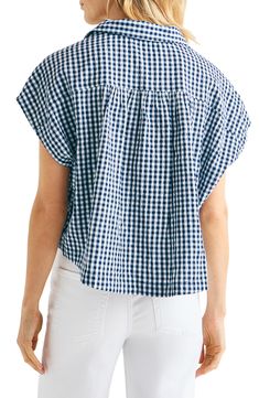 A boxy, unstructured fit adds ease to the casual charm of a cheery gingham seersucker shirt. 22" length Front button closure Spread collar Short sleeves 70% cotton, 28% rayon, 2% spandex Machine wash, line dry Imported Relaxed Fit Plaid Shirt For Day Out, Gingham Cotton Short Sleeve Tops, Preppy Cotton Tops For Day Out, Short Sleeve Gingham Blouse For Day Out, Spring Plaid Tops For Everyday, Everyday Gingham Button-up Tops, Summer Plaid Blouse With Relaxed Fit, Casual Gingham Blouse For Daywear, Everyday Plaid Tops For Spring