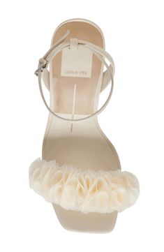 Voluminous ruffles add modern elegance to the vamp of a soirée-ready sandal framed by a squared-off toe and flared block heel. 3 1/4" heel (size 8.5) 3" strap height Adjustable ankle strap with buckle closure Leather and textile upper/synthetic lining and sole Imported Chic Fitted Sandals With Block Heel, Chic Summer Wedding Heels, Elegant Spring Block Heels With Padded Heel, Evening Sandals With Ruffles For Spring, Spring Evening Sandals With Ruffles, Elegant Evening Sandals With Ruffles, Beige Stacked Heel Block Heels For Party, Beige Block Heels With Stacked Heel For Party, Ruffled Sandals For Spring Evenings