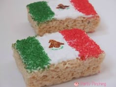 two pieces of rice krispy treats with italian flag frosting