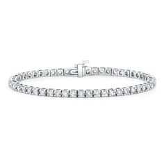 This stunning tennis bracelet is 18-karat white gold set with 3.25-carats of collection diamonds. Click here to see our bracelet size guide for sizing options and fit. Bracelet Size Guide, Luxury Diamond Jewelry, Bracelet Diamond, White Gold Set, Diamond Tennis Bracelet, Initial Bracelet, White Gold Jewelry, Tennis Bracelet Diamond, Bracelet Collection