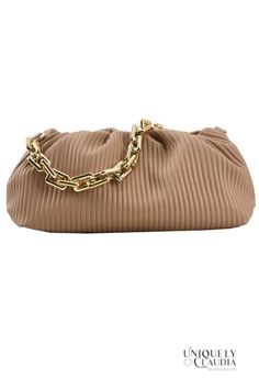 Gorgeous and unique to take your style up a notch...check out our Shaune Pleated Handbag – it's chic, sophisticated, and totally on trend. This ultra-soft vegan leather bag comes with two straps, and it is a 3-in-1...it can me worn as a clutch, under-shoulder, or crossbody. A goldtone bold chainlink, and a crossbody strap that lets you go hands-free. Plus, the pleated design is both eye-catching and elegant, and the handbag itself is spacious enough to hold all your essentials. Whether you're he Elegant Brown Baguette Bag For On-the-go, Elegant Soft Leather Clutch For On-the-go, Trendy Faux Leather Bag For On-the-go, Trendy Beige Bag With Chain Strap, Trendy Brown Baguette Bag For On-the-go, Beige Double Handle Bag With Chain Strap, Beige Bags With Chain Strap And Double Handle, Chic Soft Leather Clutch Satchel, Daily Use Faux Leather Shoulder Bag With Chain Strap