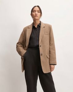 Borrowing from the boys never looked so good. Our Oversized Blazer has a roomy, menswear-inspired shape and modern look—complete with cuff buttons, flap pockets, and recycled shoulder pads that add the perfect amount of polish. Plus, it’s made with recycled Italian wool, which gives it a visual drape and tangible warmth. Effortless Fall Outfits, Winter Blazer, Houndstooth Blazer, French Women, Tailored Blazer, Plaid Blazer, Menswear Inspired, Oversized Blazer, Fall Wardrobe