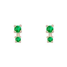 The Alula earrings are a classic staple. Two emeralds are set in fairmined gold for a bold sparkle. Perfect everyday earrings to mix and match in any piercing. Looks amazing with our other hoops and ear climbers and gives the illusion of a double pierced look. Emeralds measure .03cts, .06cts, total for single is .09cts, and pair is .18cts. Emerald Earrings For Everyday And May Birthstone, Green Huggie Earrings With Prong Setting, Emerald Earrings For Everyday May Birthstone, Everyday Green 14k Gold Earrings, Single Emerald Earring In Yellow Gold, Fine Jewelry Emerald Single Earring, Everyday Green Emerald Earrings, Classic Pear-shaped Emerald Earrings, Elegant Nickel-free Emerald Earrings