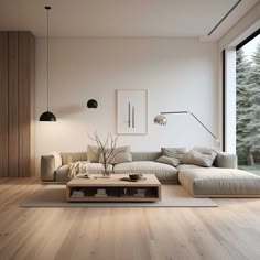 a living room filled with furniture and a large window next to a wooden floored wall