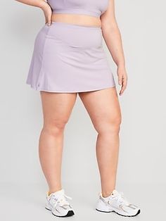 Power up in our PowerSoft skort -- light compression fabric meets a ridiculously smooth, peachy-soft feel Elasticized extra high-rise waistband, with light-reflecting Old Navy Active logo at center back.  Quick-drying, breathable woven skirt dries in Casual Running Bottoms With 5-inch Inseam, Fitted Bottoms With Built-in Shorts For Light Exercise, Casual Tennis Skirt With Built-in Shorts, Workout Skort With Wide Waistband, Stretch Skort With Side Pockets For Sports, Casual Skort With Built-in Shorts For Running, Fitted Workout Skort With Side Pockets, Workout Skort With Short Inseam And Pockets, Athleisure Workout Skort With Pockets