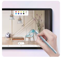 a person is drawing on an ipad with a pen in their hand, and the image shows a living room