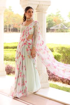 Georgette Pre-Drape Saree with Bias flare and pallu of floral Printed chiffon. Paired with heavily embroidered blouse with pearl details on hem Elegant Floral Print Choli With Traditional Drape, Elegant Floral Print Traditional Choli, Elegant Floral Print Georgette Sharara, Elegant Georgette Pre-draped Saree With Floral Print, Elegant Pre-draped Georgette Saree With Floral Print, Floral Print Georgette Choli With Traditional Drape, Georgette Choli With Floral Print And Traditional Drape, Festive Pre-draped Saree With Floral Print For Reception, Festive Floral Print Pre-draped Saree For Reception