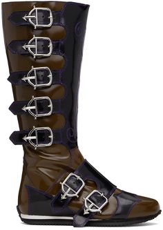 Calf-high patent leather boots in brown and black. · Pin-buckle straps at vamp and ankle · Zip closure at inner side · Grained leather lining · Treaded rubber sole · Contrast stitching in purple Supplier color: Black/Brown Castle Core, Pinterest Predicts, 2025 Trends, Chopova Lowena, Patent Leather Boots, Black Pins, Gucci Black, Designer Boots, Perfect Shoes