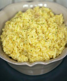 a close up of a bowl of food on a table