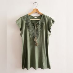 I Believe This Is A Linen Blend. Never Worn. New Without Tags. Casual Cotton Blouse With Tassel Ties, Green Spring Tops With Tassels, Spring Green Tops With Tassels, Casual Short Sleeve Tops With Tassel Ties, Casual Cotton Blouse With Back Tassel Tie-up, Short Sleeve Cotton Blouse With Tassels, Cotton Short Sleeve Blouse With Tassels, Cotton Blouse With Tassels And Short Sleeves, Cotton Beach Tops With Tassels