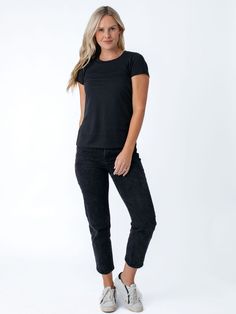 Introducing the New Fit Women's Black Crew Neck! You talked, and we listened. Our women’s tees now have an updated fit. After launching our women’s tees, several things quickly became apparent. You LOVED the timelessly cool look of our premium fitted tees, and buttery softness of our Stratusoft fabric. You also told us there was an opportunity to improve the fit, so we got out our tape measures, and brought in women of all shapes and sizes to try on t-shirts until the fit was just right. We coul Tape Measures, Unique Fabric, Winter Essentials, Workout Tee, Try On, Winter Women, Black Tee, Cool T Shirts, Amazing Women