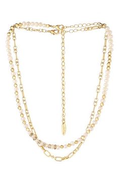 Freshwater pearls, sparkling crystals and polished beads match up with goldtone chain links to create a glowing pair of necklaces perfect for layering. Set of two necklaces 14" shortest length; 15" longest length; 5" extenders Lobster clasp closures Pearl size: 5–5.5mm Freshwater pearl/18k-gold plate/glass Imported Gold Multi-strand Pearl Necklace With Adjustable Chain, Gold Pearl Necklace For Layering, Gold Double Strand Pearl Necklaces, Gold Pearl Beaded Chain Layered Necklace, Gold Pearl Layered Necklace With Beaded Chain, Gold Multi-strand Pearl Layered Necklace, Gold Pearl Multi-strand Layered Necklace, Gold Multi-strand Pearl Chain Necklace, Gold Pearl Beaded Necklaces With Chain