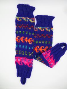 Hand knitted Alpaca and Acrylic These colorful and amazing Leg alpaca Warmers are incredibly soft, warm and comfortable that will keep your legs toasty during these cold winter days. These beautiful leg warmers are handmade in the highlands of Peru. Each one is very unique with vibrant colors and they are perfect for wearing with boots or just for wearing around the house. They are perfect as a compliment to your winter wardrobe. Material: Alpaca Yarn blended One size only - the knitted material Casual Multicolor Knitting Pattern For Winter, Casual Multicolor Knitted Leg Warmers, Winter Purple Knitting Pattern, Cozy Knit Patterns For Winter, Cozy Winter Knit Patterns, Winter Soft Knit Fitted Knitting Pattern, Winter Multicolor Knitting Pattern, Fitted Soft Knit Winter Knitting Pattern, Casual Multicolor Fair Isle Pattern