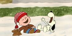 a cartoon character laying in the snow next to a dog with a red hat on