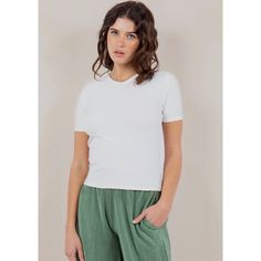 This luxuriously soft Stretch Baby Tee is crafted from a blend of lightweight nylon and spandex, providing superior comfort and unrestricted movement. With its figure-hugging fit and classic silhouette, this tee is sure to become a wardrobe staple for any stylish woman. Modeled in size S Women Clothing Boutique, Classic Silhouette, Baby Tee, Infant Tees, Boutique Clothing, Stylish Women, Dress Collection, Wardrobe Staples, Latest Fashion Trends