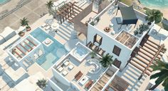 an aerial view of a beachfront home