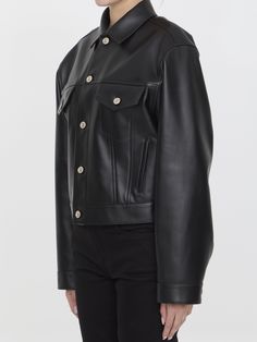 Black leather jacket. It features shirt collar, front button closure, two buttoned flap pockets on chest, two side welt pockets and buttoned cuffs. Small fit. The model is 178cm tall and wears size S.Size nationality: US Product number: 2060130 Product code: 773439TPS301000 Composition: 100% leather Balenciaga Leather Jacket, Balenciaga Leather, Platform Wedge Heels, Loafer Sneakers, Black Leather Jacket, Premium Brands, Dress With Cardigan, Clothes Collection, Cardigan Jacket