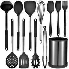 an assortment of kitchen utensils are shown in black and silver colors, including spatulas