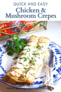 chicken and mushroom crepes on a blue and white plate with cilantro