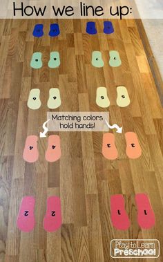 the floor is covered in different colors and shapes, with words on it that read how we line up matching colors hold hands