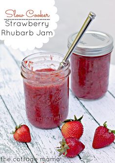 two jars of strawberry rhubarb jam with strawberries