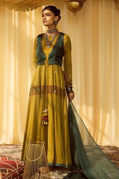 Shop for these amazing collections of Yellow Modal Satin Embroidery Thread And Mirror Work Waistcoat & Anarkali Set For Women by Zariya the Label online at Aza Fashions. Unstitched Green Choli With Mirror Work, Green Unstitched Choli With Mirror Work, Designer Green Salwar Kameez With Mirror Work, Floor-length Green Salwar Kameez With Mirror Work, Anarkali Pista Green Sharara With Mirror Work, Green Anarkali Set With Mirror Work, Green Floor-length Salwar Kameez With Mirror Work, Pista Green Anarkali Sharara With Mirror Work, Green Floor-length Anarkali Set With Mirror Work