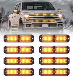 four yellow led lights on the front of a white pickup truck with trees in the background