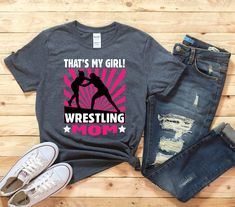 "💥15% off After-Holiday Sale Event🎈 Get your Wrestling Gift Today! Crush Retro is a premium clothing brand that serves you and only you. We will go out of our way to make you 100% satisfied under any circumstances. We will always use the highest quality shirt brands. They have the highest rating between softness, stretchability, and overall look/feel. Everything is made and printed in the USA. No outsourced junk from other countries. This wrestling apparel is everything you've dreamed of and m High School Wrestling, Wrestling Mom Shirts, Wrestling Gift, Wrestling Shirt, Feel Everything, Wrestling Team, Wrestling Shirts, Wrestling Mom, University Shirt