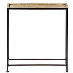 an iron and wood table with gold trimmings on the top, against a white background