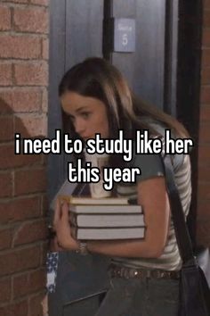 a girl with books in her hand and the words i need to study like her this year