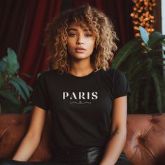 Paris France Bella and Canva T-shirt. About our tees: This classic unisex jersey short sleeve tee fits like a well-loved favorite. Soft cotton and quality print make users fall in love with it over and over again. These t-shirts have-ribbed knit collars to bolster shaping. The shoulders have taping for better fit over time. Dual side seams hold the garment's shape for longer.  Sizing Chart: Use the sizing chart to understand the measurement of our T-Shirts. For the oversized look, please size up. Return policy:  We do not accept returns unless items are damaged. This is due to our shirts being custom made-to-order. Paris Tshirt, Vacation In Paris, Travel To France, Paris Gifts, Travel Tees, Europe Trip, Travel Lover, Paris Travel, Tour Eiffel