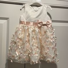 Nwot Girls 12 Month Dress. Cream And Pink Flower Skirt With 3 Layers. White Top. Includes Diaper Cover. Cute Pink Princess Dress For Spring, Cute Spring Pink Princess Dress, Cute Pink Dresses With Floral Applique, Cute Pink Dress With Floral Applique, Cute Pink Princess Dress With Floral Applique, White Princess Dress With Floral Applique, Pink Flower Princess Dress For Dress-up, Flower Skirt, Dress Cream