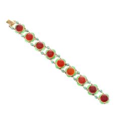 This fine and impressive antique Red Carnelian bracelet has been crafted in 14K yellow gold, and is composed of nine set cabochon-cut Carnelian links. The links articulate via integrated ring loops and jade beads to either end of each of the settings. The cabochon carnelians sit on a 14K Yellow Gold and green enamel flower shape. The bracelet secures with a discreet integrated push fit clasp to the underside of one of the carnelian cabochon set links. 14K yellow gold Cabochon Red Carnelian, Gree Luxury Unique Cabochon Bracelets, Luxury Multicolor Cabochon Bracelet, Carnelian Bracelet, Art Deco Bracelet, Jade Bracelet, Enamel Flower, Green Enamel, Jade Beads, Fine Jewelry Collection