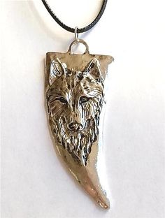 Silver Gold Wolf Head Necklace Plated Pendant Tooth Black Cord Tribal Wolves #SouthMiamiBeachBoutique #Pendant Wooden Wolf Head Necklace, Wolf Tooth Necklace, Wolf Pendant Necklace, Dog Lover Jewelry, Wolf Pendant, Life Jewelry, Wolves Pendants, Lover Jewelry, Wolf Necklace