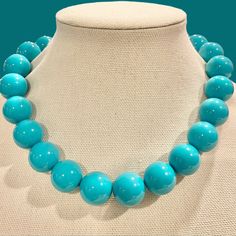 This unique necklace is made on strong stretch cord and is easily pulled on and off over the head. There is no clasp.  This stunning teal blue necklace is meticulously handcrafted with colorful 20mm acrylic beads, strung on strong elastic for a comfortable fit. The knot is reinforced with jewelers glue, ensuring durability and longevity. With a variety of lengths to choose from, you can find the perfect fit for your style.  IS THE ELASTIC DURABLE? The elastic is 1mm and is intended for jewelry m Turquoise Necklaces With 8mm Beads, Turquoise Necklaces With 8mm Round Beads, Turquoise Necklace With 8mm Round Beads, Turquoise Beaded Necklaces With 8mm Beads, Turquoise Beaded Necklace With 8mm Beads, Turquoise Large Beads, Turquoise Large Round Beads, Large Round Turquoise Beads, Turquoise Round Beaded Necklace For Gifts