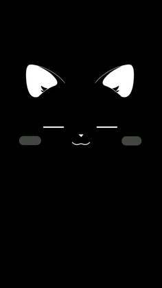 a black cat's face with white eyes and long eyelashes on the dark background