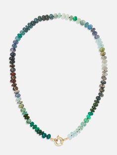 The Encirkled Camo Gemstone Beaded Necklace is the ultimate addition to your neck stack, featuring a 14k spring ring closure, that is perfect for displaying your favorite charms. 8mm assorted gemstones that may include agate, amber, aquamarine, aventurine, cat's eye, chocolate moonstone, chrysoprase, emerald, fluorite, chrysocolla, green onyx, jasper, labradorite, malachite, pyrite, sapphire, smoky quartz, tourmilated quartz Gemstone card comes with each necklace with list of included gemstones