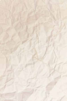 a piece of white paper that has been wrinkled