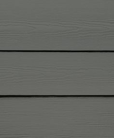 Hardie® Plank Statement Collection™ Cedarmill® Fiber Cement Lap Siding with ColorPlus Technology® has a woodgrain appearance making it ideal for exteriors where a traditional wood siding look is desired. ColorPlus Technology® is different from paint applied after siding install. Developed specifically for James Hardie designed fiber cement siding, ColorPlus Technology® is applied in a controlled factory environment to ensure consistent coverage and color that lasts longer. ASTM E136 noncombustible cladding will not attract pests including termites and woodpeckers. HZ10® engineering means it is made to withstand high heat, humidity, moisture, hail, tropical storms and hurricane winds. Board features ColorPlus Technology® in Aged Pewter for a warm gray finish. James Hardie Statement Collecti James Hardie Siding Colors, Fiber Cement Lap Siding, Siding Colors For Houses, Garage Inspiration, Rustic Houses, James Hardie Siding, Houses Exterior, Hardie Siding, Siding Options