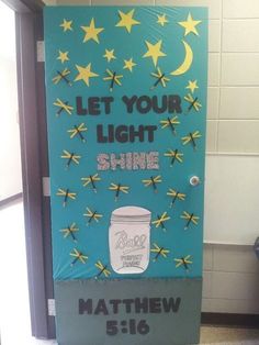 a door decorated with the words let your light shine