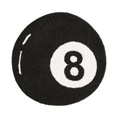 a black and white eight ball rug with the number 8 on it