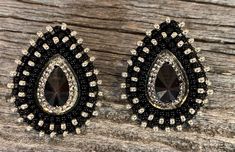 "Classic black teardrop earrings  Beaded earrings are on a post with a leather backing, these will catch all light and make you sparkle! Done with 2 types of beads, black & silver bead, they are rich looking earring with just the right amount of sparkle measuring 1\" inches wide 1 1/4\" inches long on post backing These would be a fabulous earring for any type of formal dress as well as every day with jeans. ALL ITEMS ARE MADE TO ORDER AND DONE IN ORDER OF PURCHASE  I am First Nation, Plains Cre Native Earrings, Silver Bead Earrings, Purple Peacock, Beaded Earrings Native, Peacock Earrings, Native American Beaded Earrings, Native Beadwork, Native American Beading, Earrings Beaded