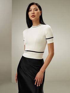 This premium mulberry silk crop top in white features a round collar, ribbed cuffs and hem. Perfect for casual wear, this slim fit top is a versatile and timeless piece. Complete your wardrobe with this silk tshirt for women. Silk Crop Top, Silk Clothes, Silk Nightwear, Contrasting Trim, Silk Knit, Slim Fit Top, Oversize Fashion, Knitwear Fashion, Knit Short