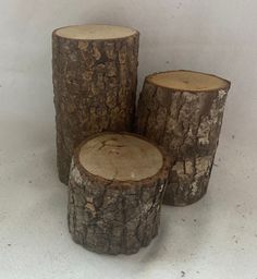 three pieces of wood sitting next to each other