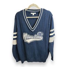 Show Off Your Love For The Penn State Nittany Lions With This Officially Licensed, Women's Football Sweater From Wear By Erin Andrews. The Blue Sweater, In Size L, Features The Team Colors And The School's Logo. Perfect For Game Day Or Any Day, This Sweater Is A Must-Have For Any Fan. The Sweater, Made By Wear By Erin Andrews, Is A Stylish And Comfortable Addition To Any Sports Fan's Wardrobe. The Product Is Brand New And Perfect For Showing Off Your Team Pride. Don't Miss Out On This Great Oppo Cotton V-neck Sweater For College, V-neck Tops For College In Winter, Fall College V-neck Tops, Blue Long Sleeve Varsity Sweater, Fall V-neck Tops For College, Blue Varsity Sweater For Fall, Cotton V-neck College Sweater, Collegiate Blue Cotton Sweater, Football Sweater