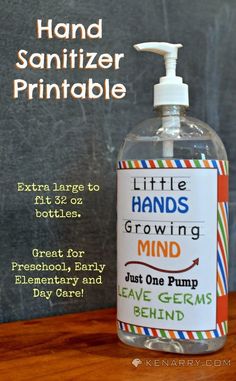 a bottle of hand sanitizer is sitting on a table with the words, hand sanitizer printable