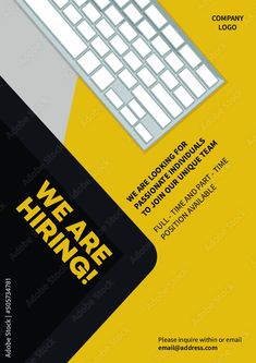 a computer keyboard and mouse sitting on top of a yellow book with the words we are hiring